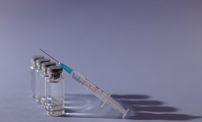 Illustration d'un vaccin et d'une seringue.